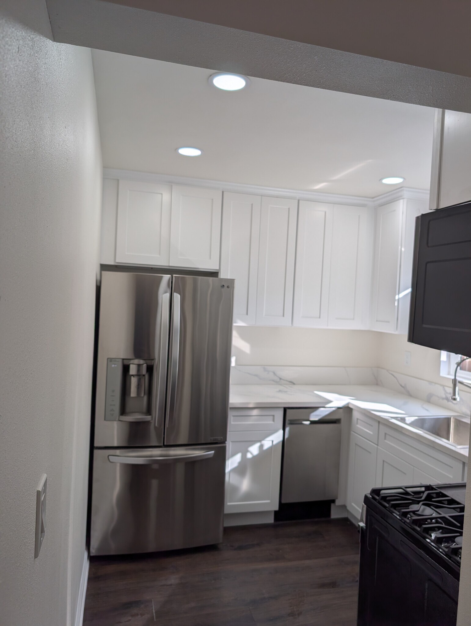 Unit B - Kitchen recessed lights - 5011 Stacy St
