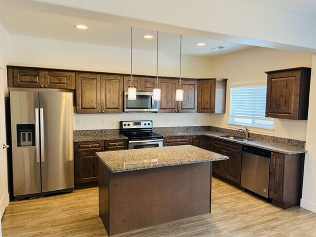 Building Photo - Beautiful 2018 townhome with 2 car garage and tall ceilings.