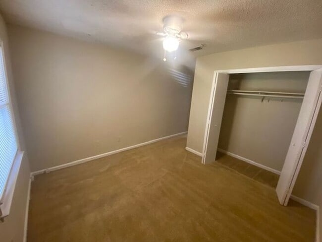 Building Photo - NOW AVAILABLE! Charming 2-Bedroom, 2-Bathroom Single-Level Townhome