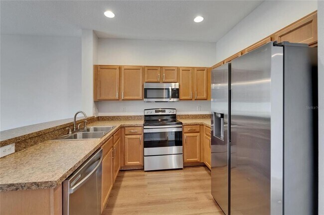 Building Photo - 8818 Red Beechwood Ct