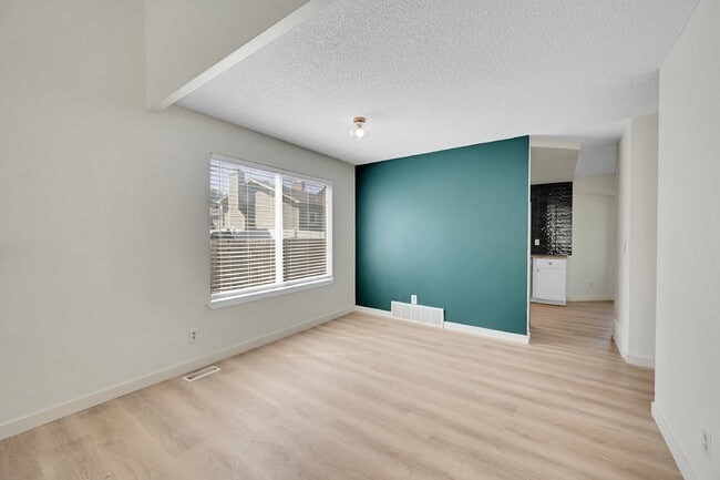 Building Photo - $2,495, 3 beds, 2.5 bath Updated Home in Co Springs with Fenced In Yard!