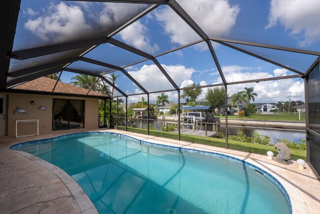 Building Photo - 3 BEDROOM • 2 BATHROOM • PRIVATE POOL • WATERFRONT • BOAT LIFT • ZERO DEPOSIT MOVE-IN AVAILABLE