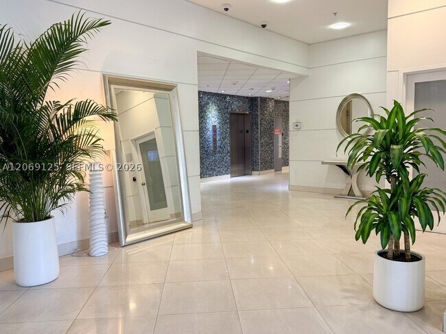 Building Photo - 19370 Collins Ave