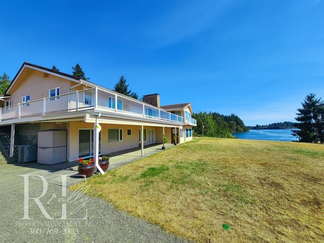 Building Photo - Waterfront Views & Peaceful Living – 2BR w...