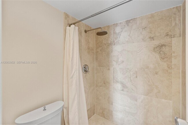 Building Photo - 3675 N Country Club Dr