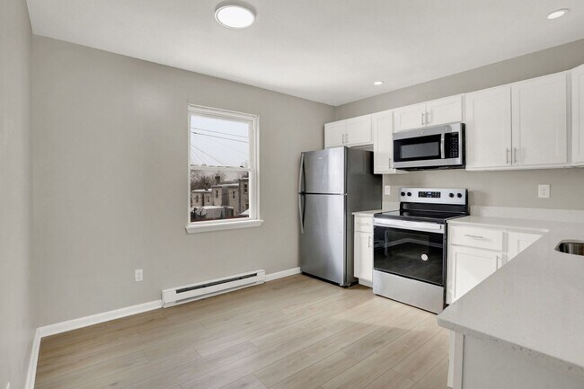 Building Photo - $100 OFF SPECIAL - Austin Street Homes - Comfort & Convenience Combined – 2BR Townhomes Now Leasing