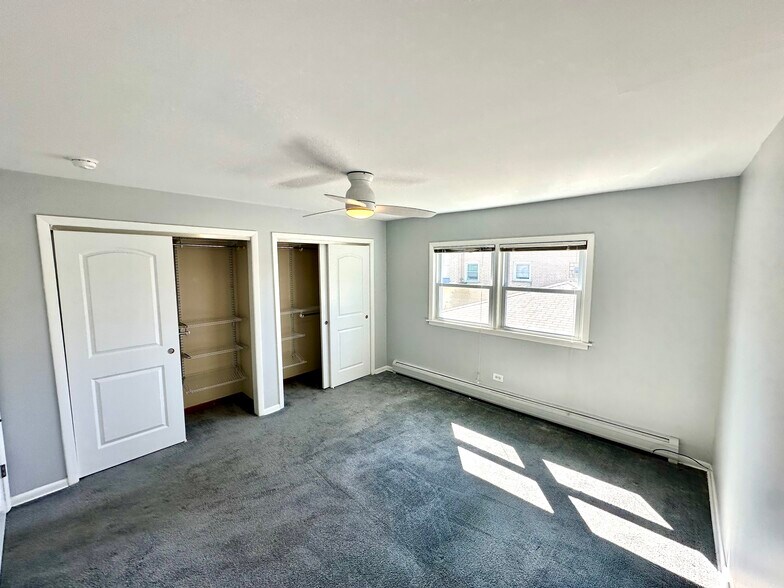 Primary bedroom with two large closets. - 671 56th St