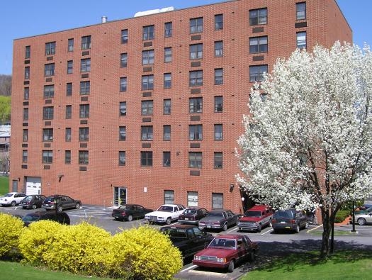 Primary Photo - Queen of Peace Apartments