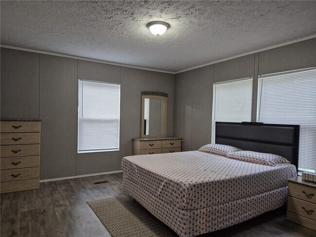 Building Photo - 6017 Whispering Pines