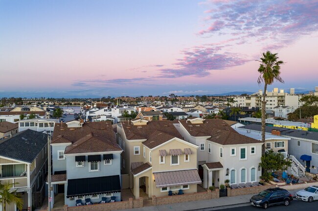 Building Photo - "Coastal Tommy Bahama at 208 East Balboa: Fully Furnished 3-Bed Sanctuary with Rooftop Deck