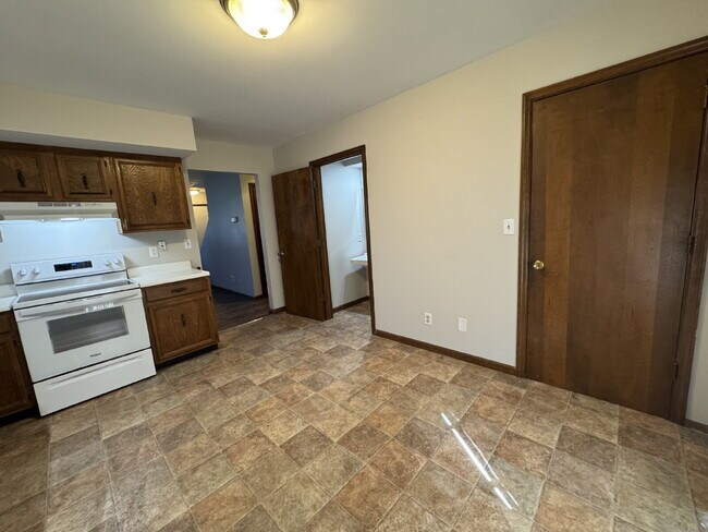 Building Photo - Up Where We Belong — Spacious 2-Story Townhome with Basement