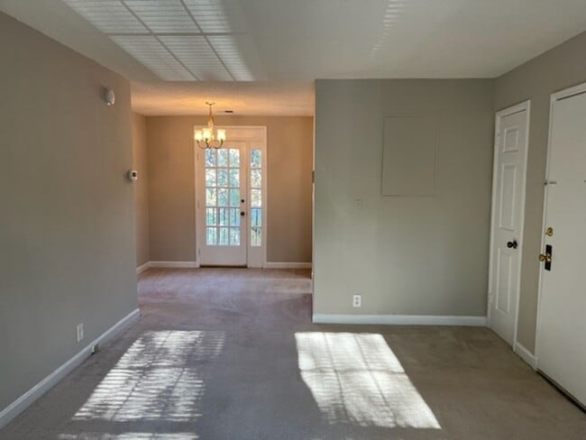 Building Photo - This residence showcases a beautifully upd...