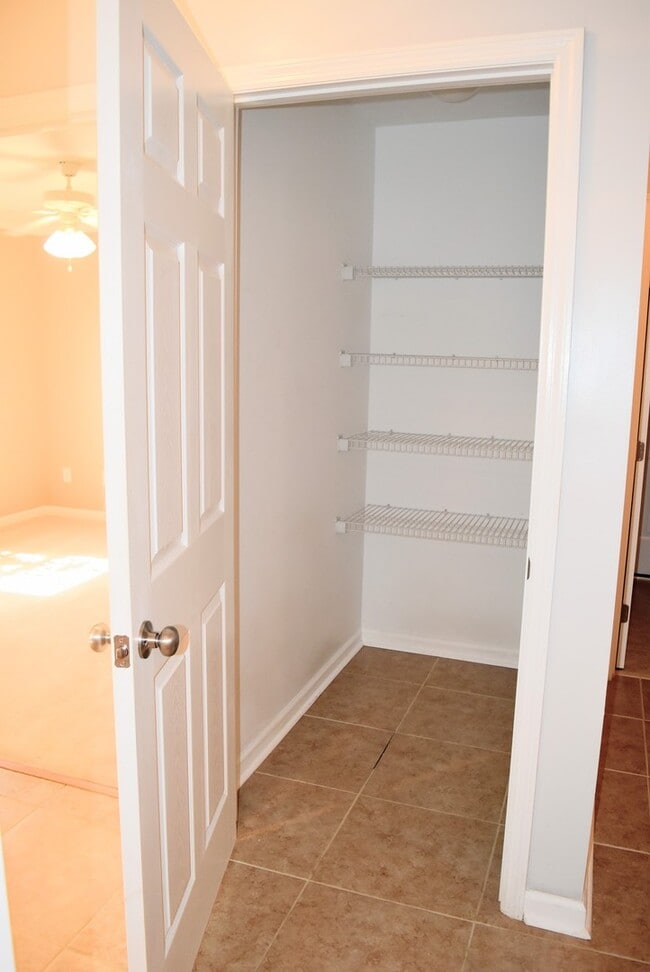 Building Photo - You've Found It! Split floor plan, fenced yard, extra storage