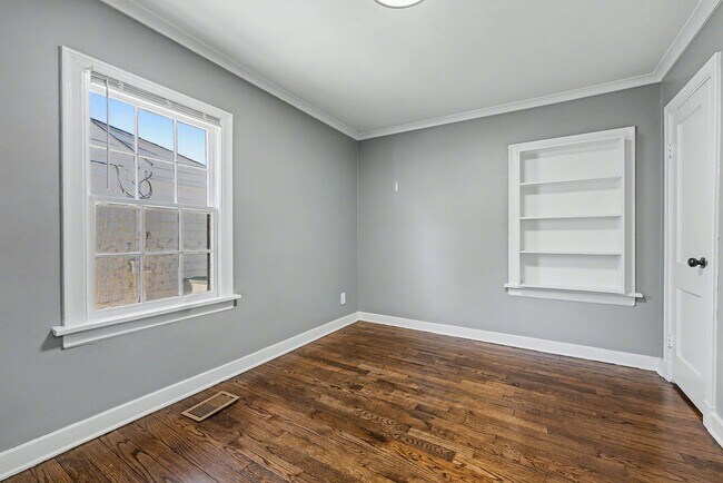 Building Photo - Charming Renovated Home Near U of M – Featuring Expansive Workshop & Garage