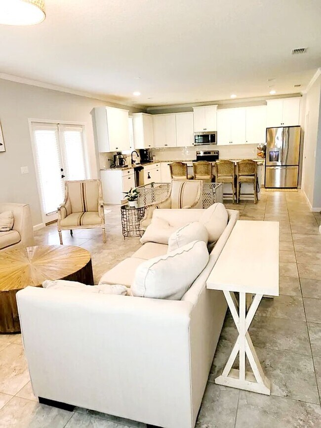 Building Photo - Spacious 4-Bedroom Home in Amelia Walk wit...