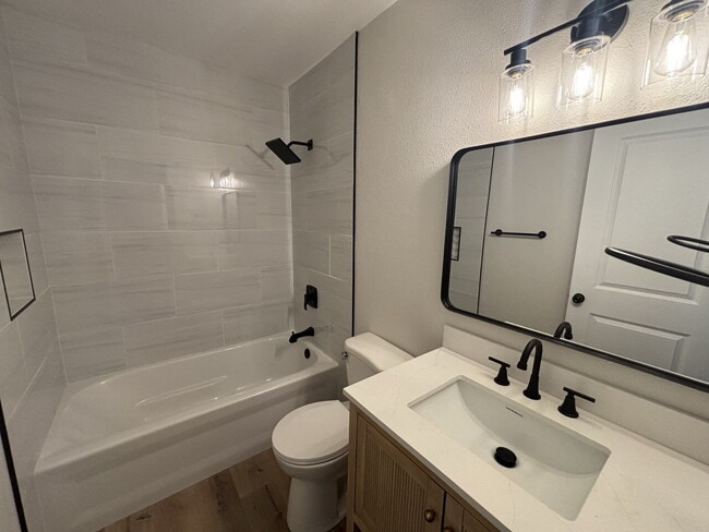 Building Photo - Fully remodeled home nestled on a spacious...