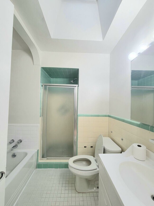 Building Photo - Stunning 4-Bedroom Townhome with Finished ...