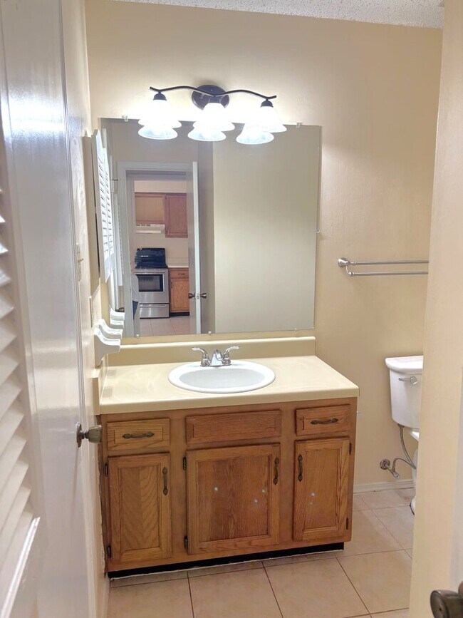 Building Photo - Two bed / Two bath condo off Grelot Road