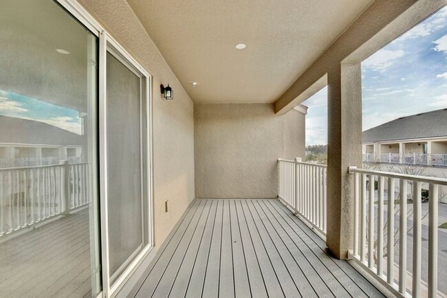 Building Photo - Luxurious 3/2.5 Modern Townhome with a Private Balcony and a 2 Car Garage in the Exclusive Gated ...