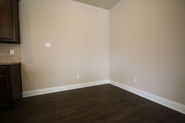 Building Photo - Beautifully Upgraded 3/2 Duplex w/ Garage & Fenced Yard | Off Camp Bowie!