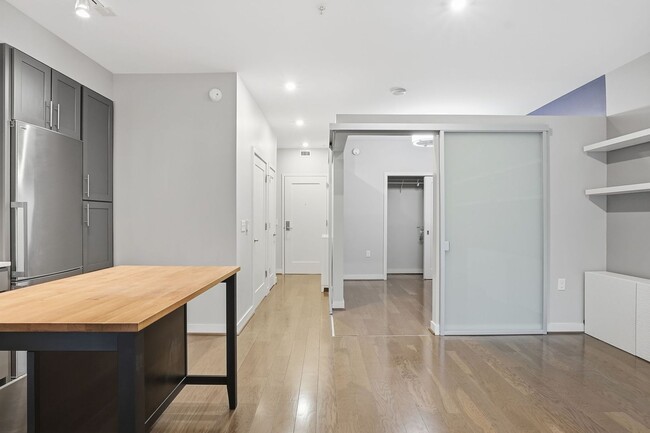 Building Photo - Modern 1BR Condo Steps to Metro, Parks & New Rec Center!