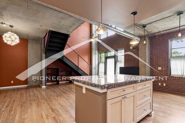 Building Photo - Modern Industrial Condo Downtown with Park...