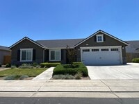 Building Photo - Immaculate like New Home in the gated Windmills at Tule Heights!