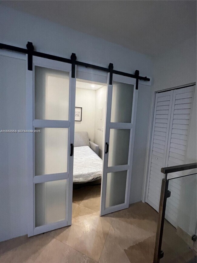 Building Photo - 6917 Collins Ave