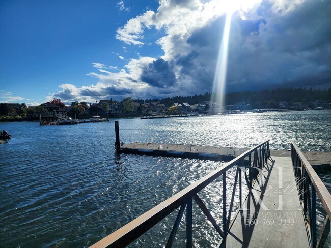 Building Photo - Waterfront Living in Indianola – Dock, Bea...
