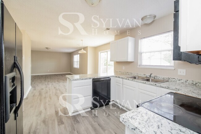 Building Photo - Enjoy living the good life in this 4 bedro...