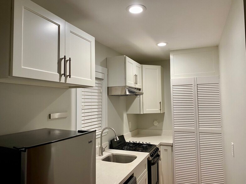 Kitchen 2 (water heater is behind panel) - 2445 Harrington Ave