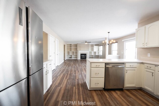 Building Photo - "Spacious 4-Bedroom Gem with Finished Base...