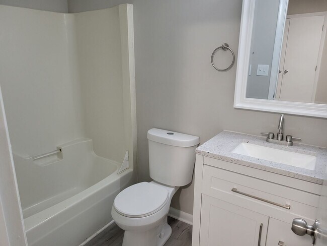 Building Photo - Renovated Duplexes with Great Specials!