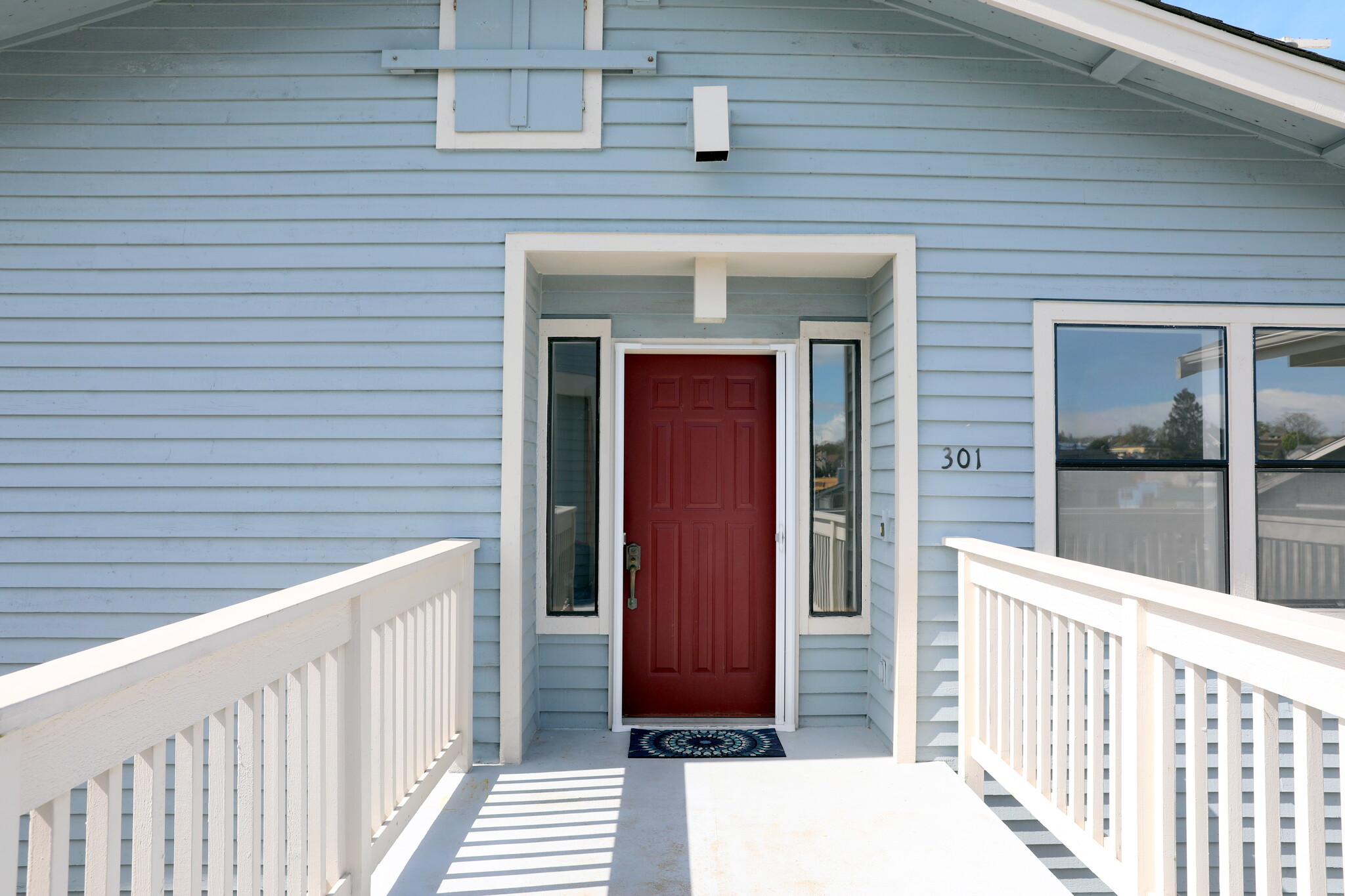 Front door entry on top floor - 651 SE Bayshore Dr