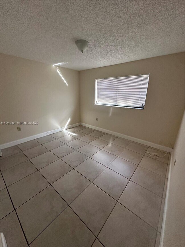 Building Photo - 4864 NW 4th Terrace