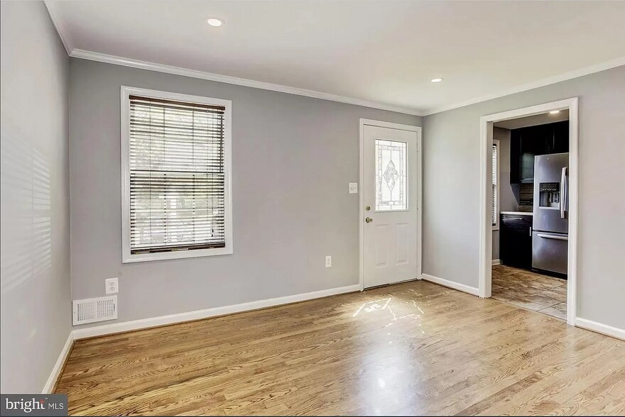 Dining Room Looking At Entrance and Kitchen - 1420 Deerfield Ln
