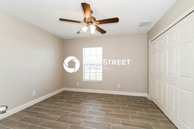 Building Photo - 3 Bedroom Pet-Friendly Home in Cape Coral, FL with Main Street Renewal