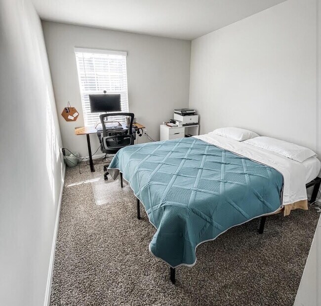 Building Photo - Free Application Fee — Refunded Upon Approval Through August 31! Modern 3BR/3BA Townhome with Gar...