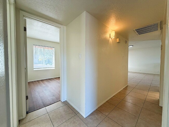 Building Photo - Newly Remodeled 3BR with Garage, Workshop, Privacy & Large Yard!