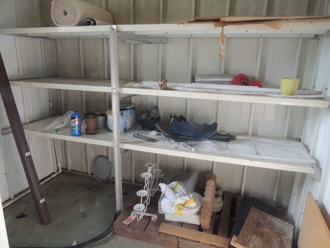 LOTS OF STORAGE IN ATTACHED SHED - 7325 Demure Ln