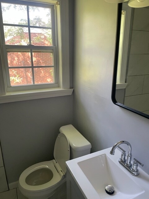 New tile floors and toilet - 1206 Church St