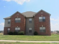 Building Photo - 10800 Frenchmen Loop Unit C