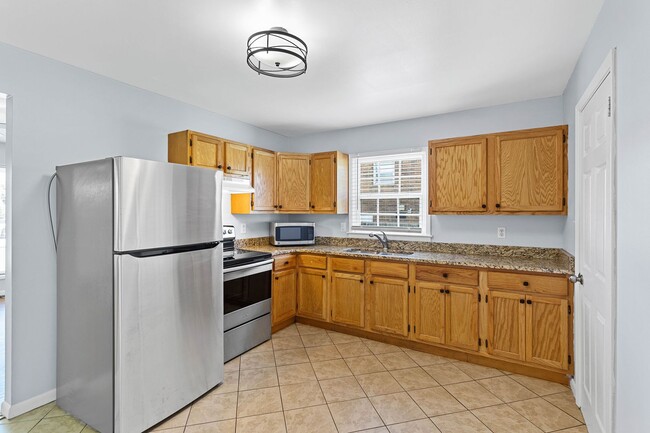 Building Photo - 4-Bed, 2-Bath Home with Fenced Yard in Win...