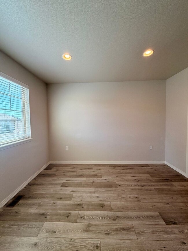 Building Photo - Move-In Ready 3-Story Townhome with Loft & 2-Car Garage