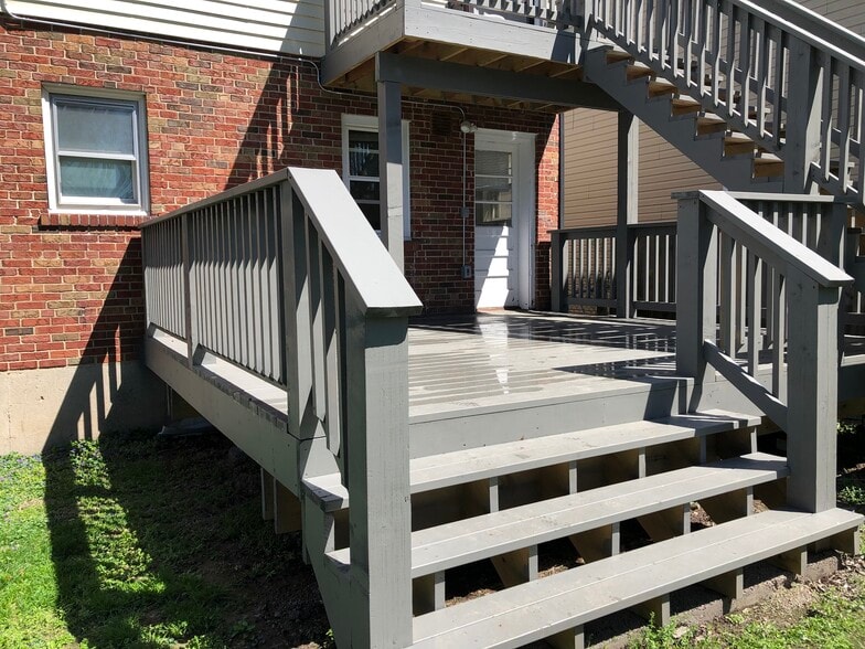Lower unit, unit B deck, 16ft x 14ft. Great space to host guests, or sit on for morning coffee. - 7558 Woodland Ave Unit B