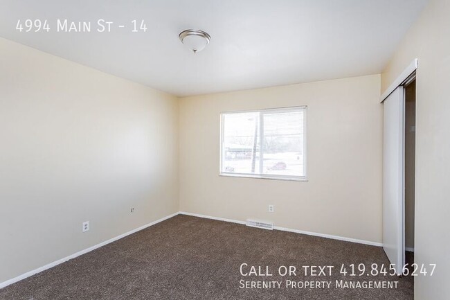 Building Photo - Fall In Love With This Two bedroom Townhom...