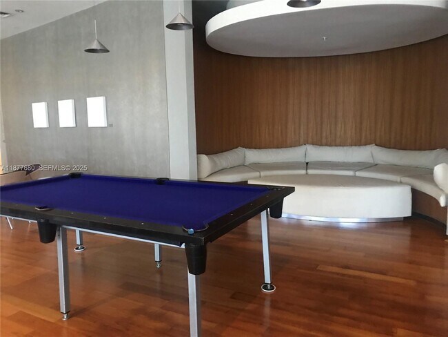 Building Photo - 10275 Collins Ave