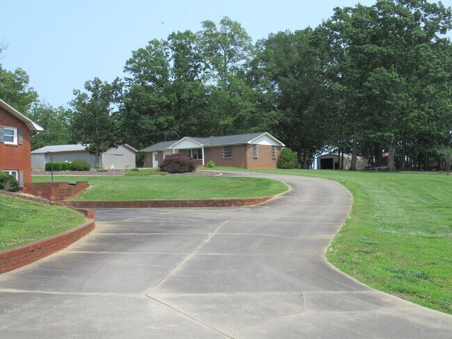 Building Photo - Charming All-Brick Ranch with Finished Bas...