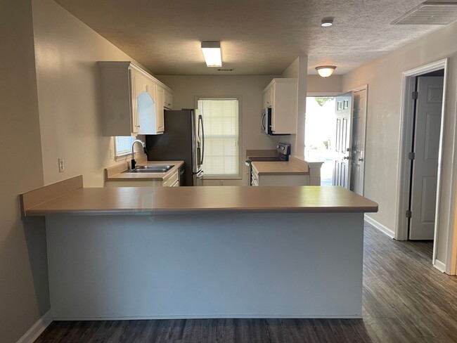 Building Photo - LOCATION - Close to everything Augusta. Updated townhome in West Wheeler Townhomes move in ready