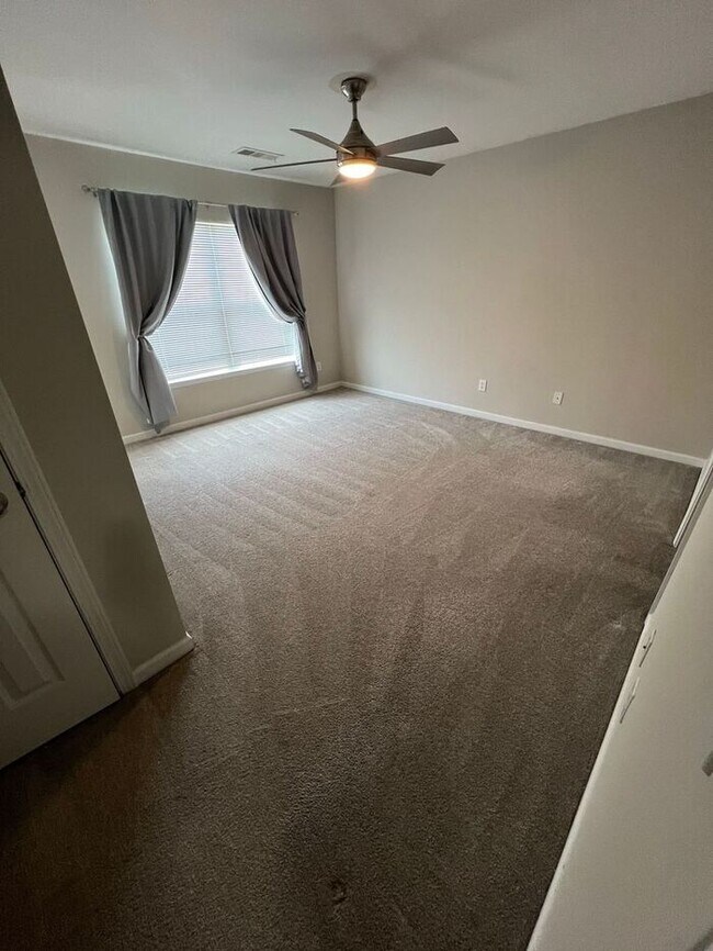 Building Photo - Spacious 2-Bedroom Townhome with Finished Studio Suite – Prime Location!